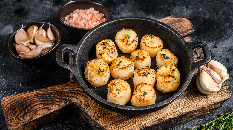 cooked scallops in a pan