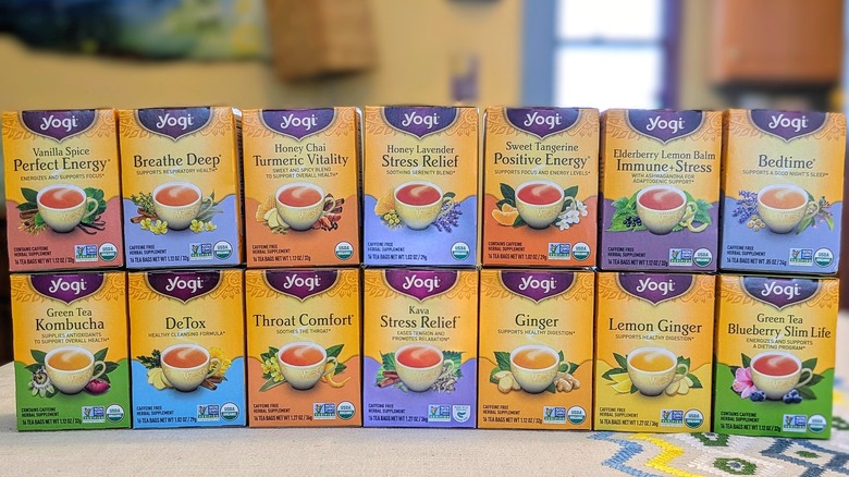 14 boxes of Yogi teas arranged in a stack