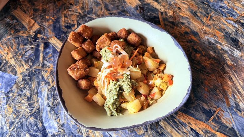 bowl meal on a table at Satu'li Canteen