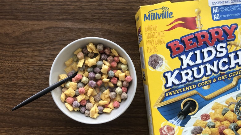Bowlful Millville Berry Kid's Krunch with milk and spoon.