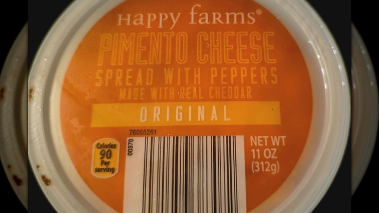 A container of Happy Farms pimento cheese spread