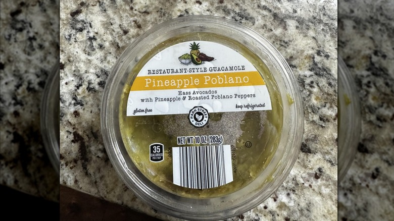 A container of Park Street Deli pineapple poblano guacamole