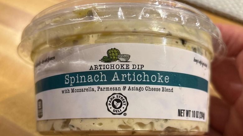 A container of Park Street Deli spinach artichoke dip