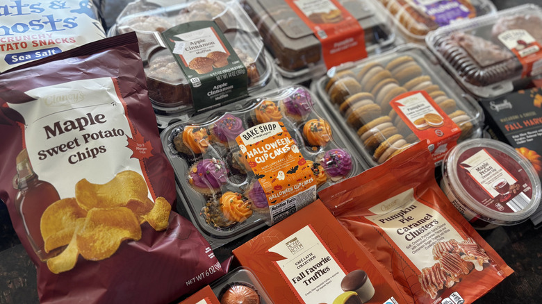 Various fall-season Aldi products laid side by side on a countertop