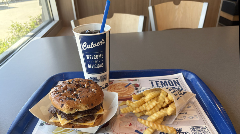 A double cheeseburger from Culver's with crinkle cut fries and a Coke