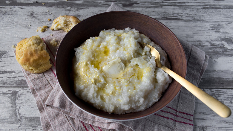 Bowl of grits topped with butter