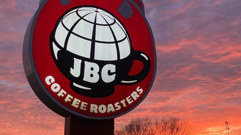 JBC Coffee Roasters Madison road sign at sunset