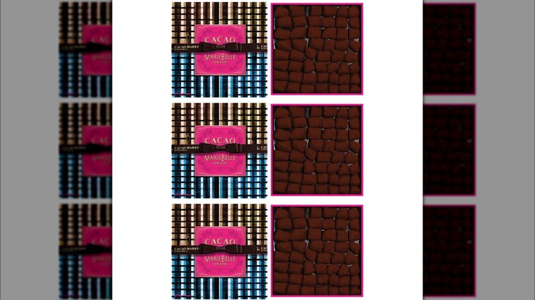Boxes of MarieBelle New York's Dark Chocolate Truffles on white backgorund