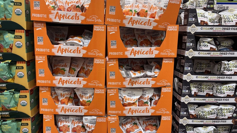 Packages of apricots stacked on top of each other