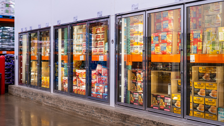 One of the freezers sections at Costco with several freezers in a row