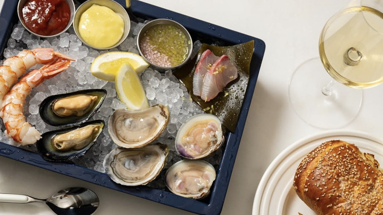 overhead shot of raw seafood and tuna carpaccio