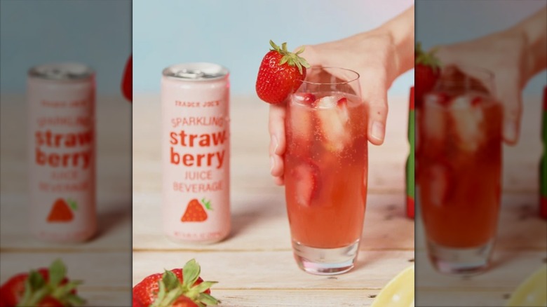 Trader Joe's sparkling strawberry juice in can and served into glass with ice