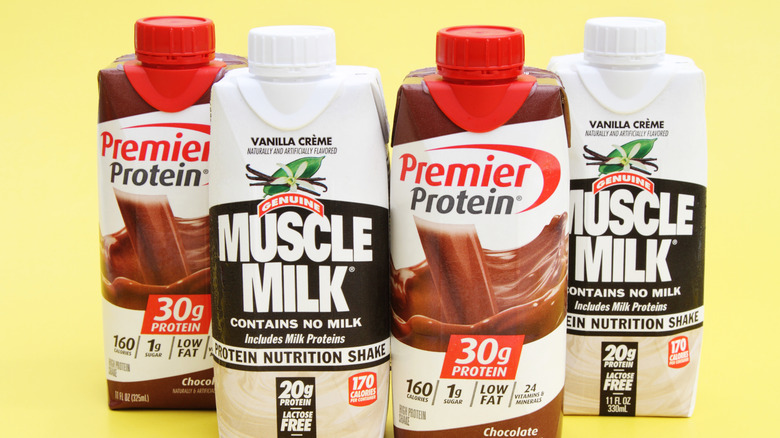 Muscle Milk nutrition shakes on yellow background