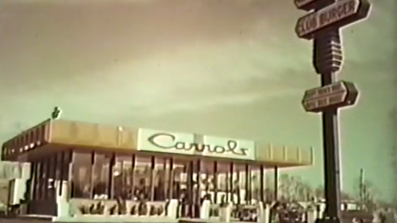 Grainy sepia image of an old Carrols restaurant with sign outside