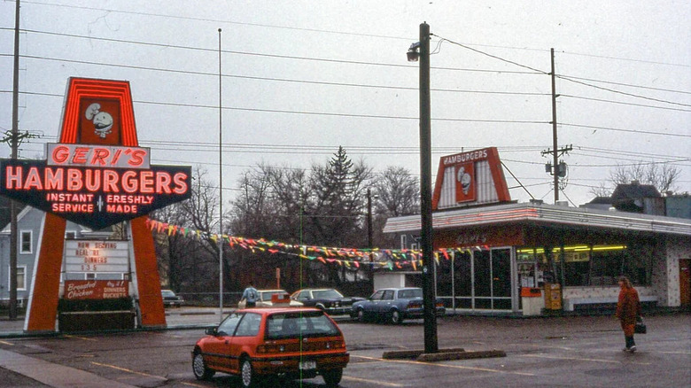 Old grainy image of Geri's Hamburgers restaurant with parking lot outside