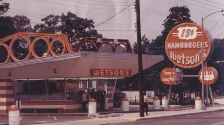 Grainy old photo of Wetson's restaurant with large sign outside