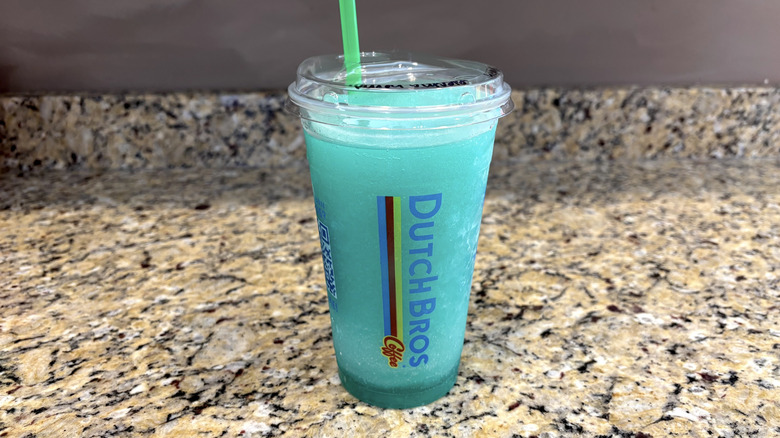 Dutch Bros electric berry lemonade on a marble countertop