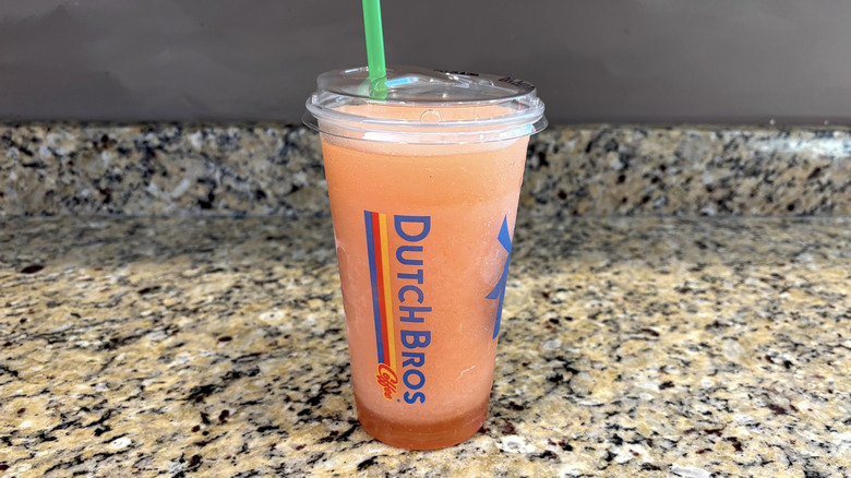 Dutch Bros OG gummy bear lemonade on a marble countertop