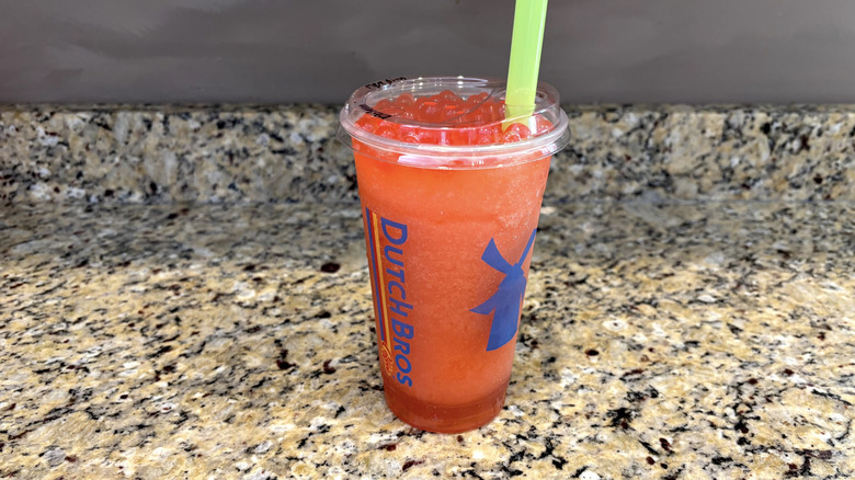 Dutch Bros poppin' boba berry lemonade on a marble countertop