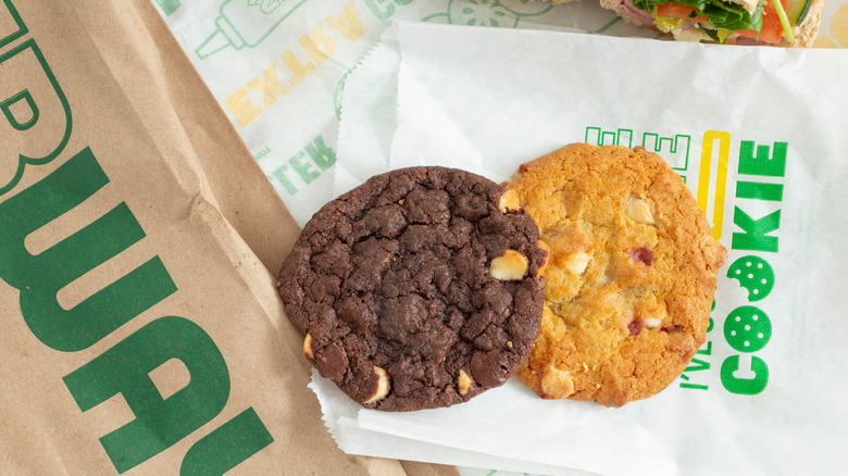 Two Subway cookies on paper envelopes