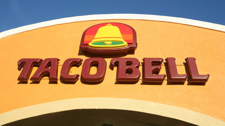 Taco Bell sign with the bell above the letters