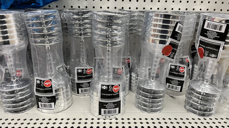 Plastic champagne glasses in a row