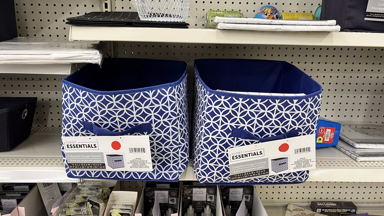 Two blue cloth collapsible storage containers