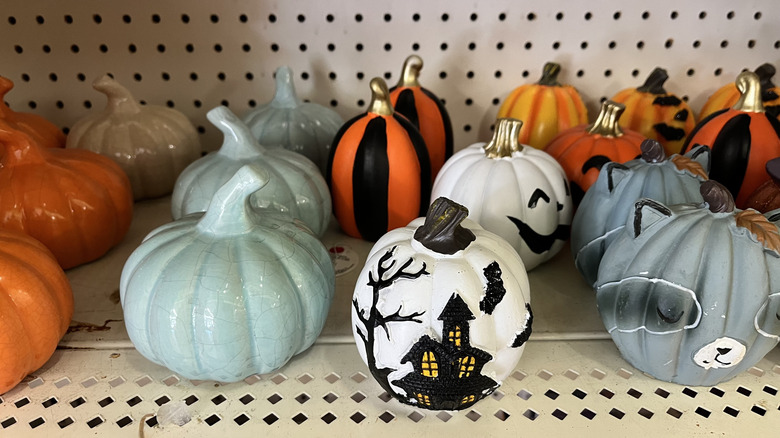 Various pumpkin figures on shelf