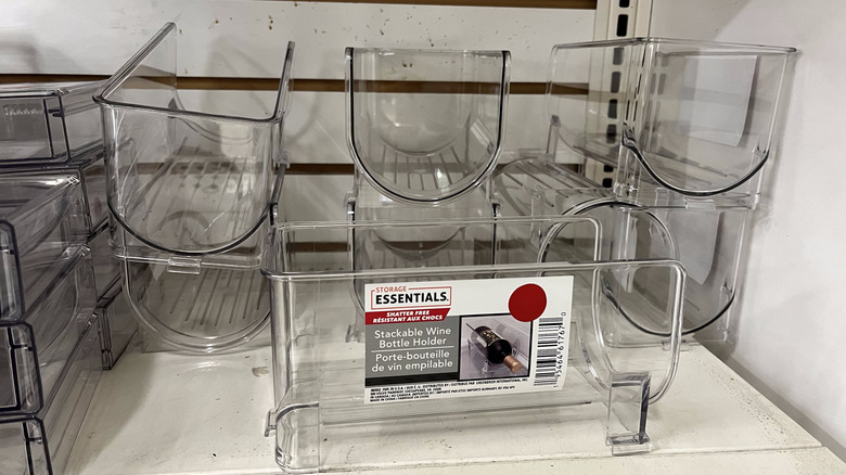 Lots of stackable wine bottle holders