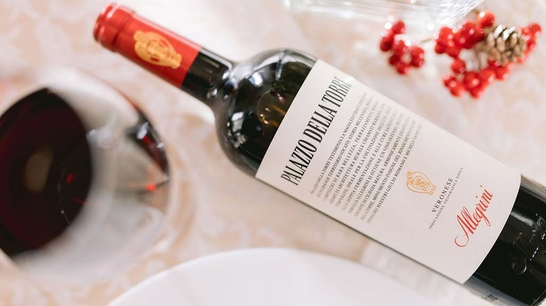 bottle of red wine lying down