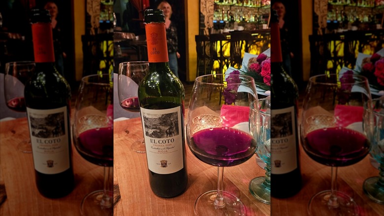 bottle and glass of red wine