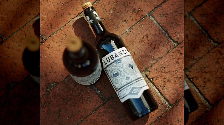 bottles of wine on brick background