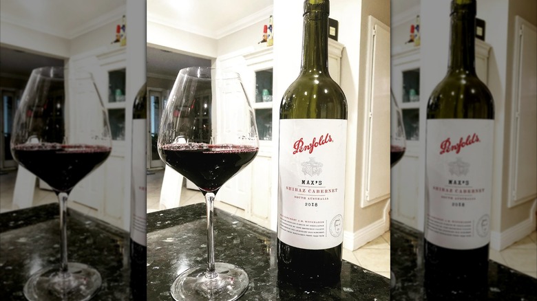 bottle and glass of red wine