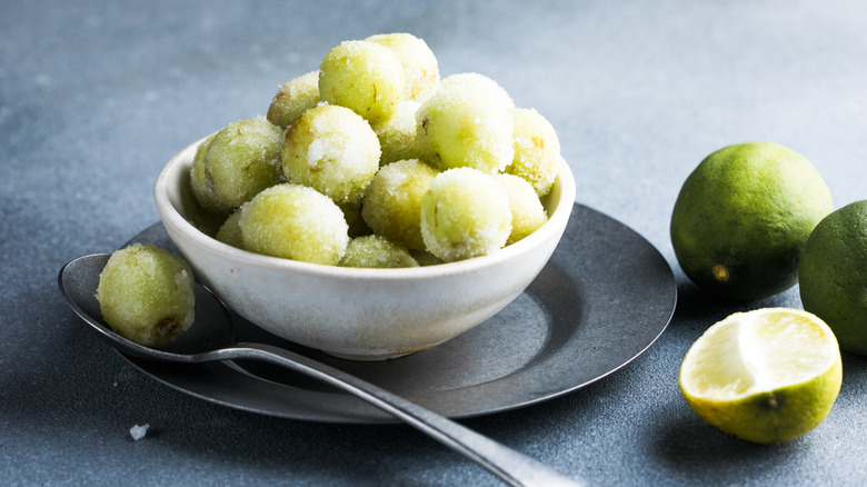 Sour candied frozen grapes in bowl
