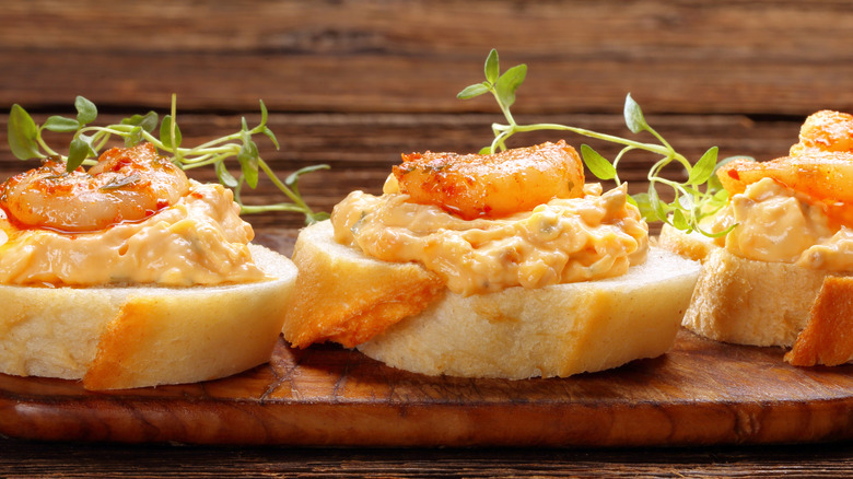 Baguettes with Southern-style shrimp paste on wooden platter