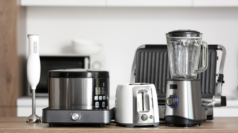 Countertop full of modern kitchen appliances