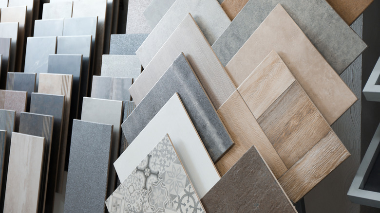 Several samples of tiles on display at a store