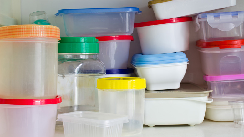 shelf with various plastic food containers