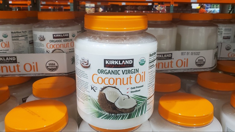 A container of Kirkland Signature organic virgin coconut oil