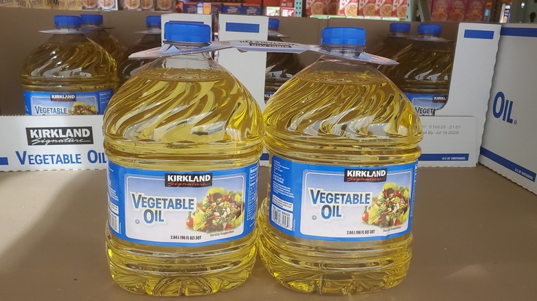 Two large bottles of Kirkland Signature vegetable oil