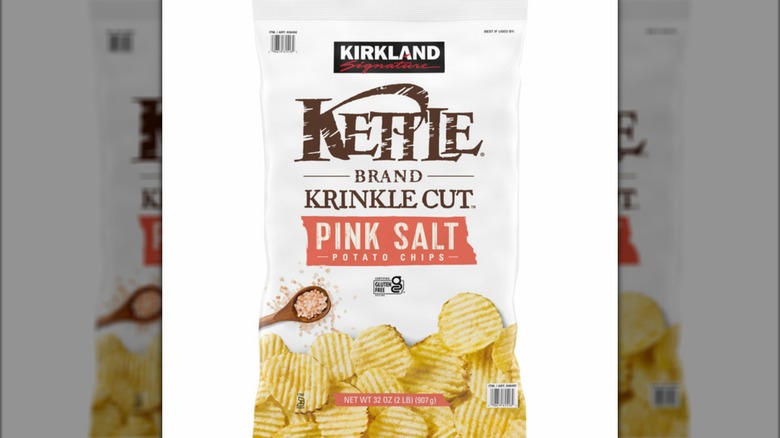 A beauty shot of a bag of Kirkland Signature Himalayan Salt Kettle Chips on a white background