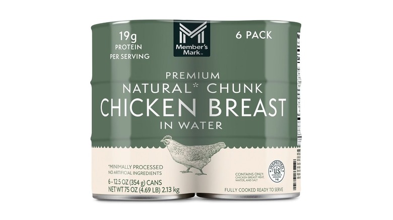 A 6-pack of Member's Mark Premium Natural Chunk Canned Chicken Breast in Water on a white background