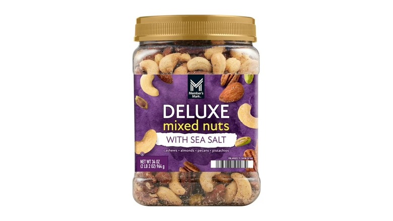 A tub of Member's Mark Deluxe Mixed Nuts with sea salt on a white background