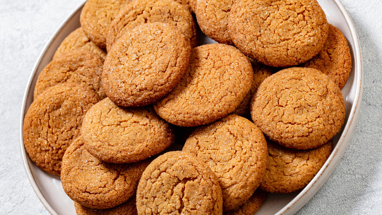 pile of gingersnap cookies on a plate