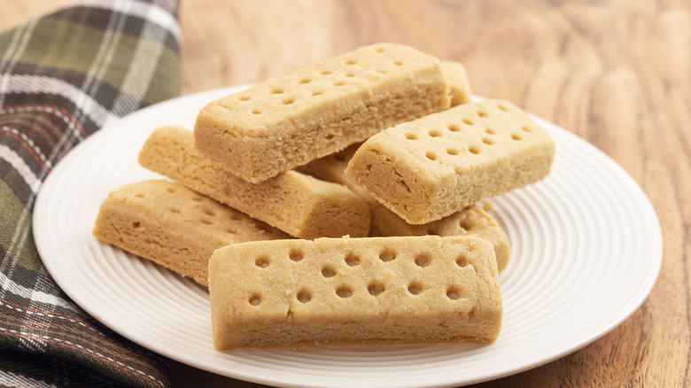 classic shortbread bars stacked on a plate