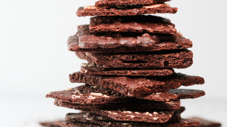 Brownie brittle pieces stacked on top of one another