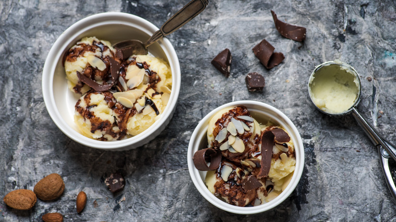 Hazelnut ice cream topped with nuts and chocolate