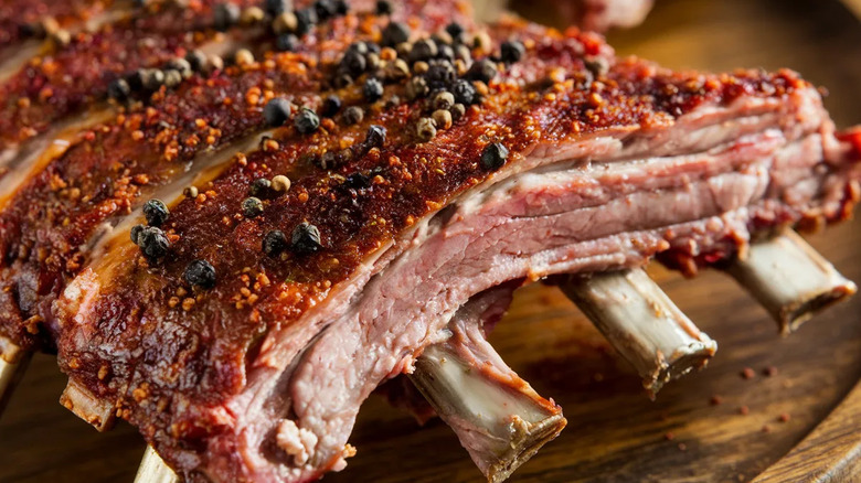 A rack of dry rub ribs on a plate