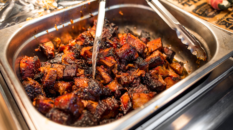 Slow-smoked brisket burnt ends in a serving pan