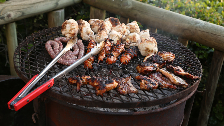 Various South African style meats atop a grill
